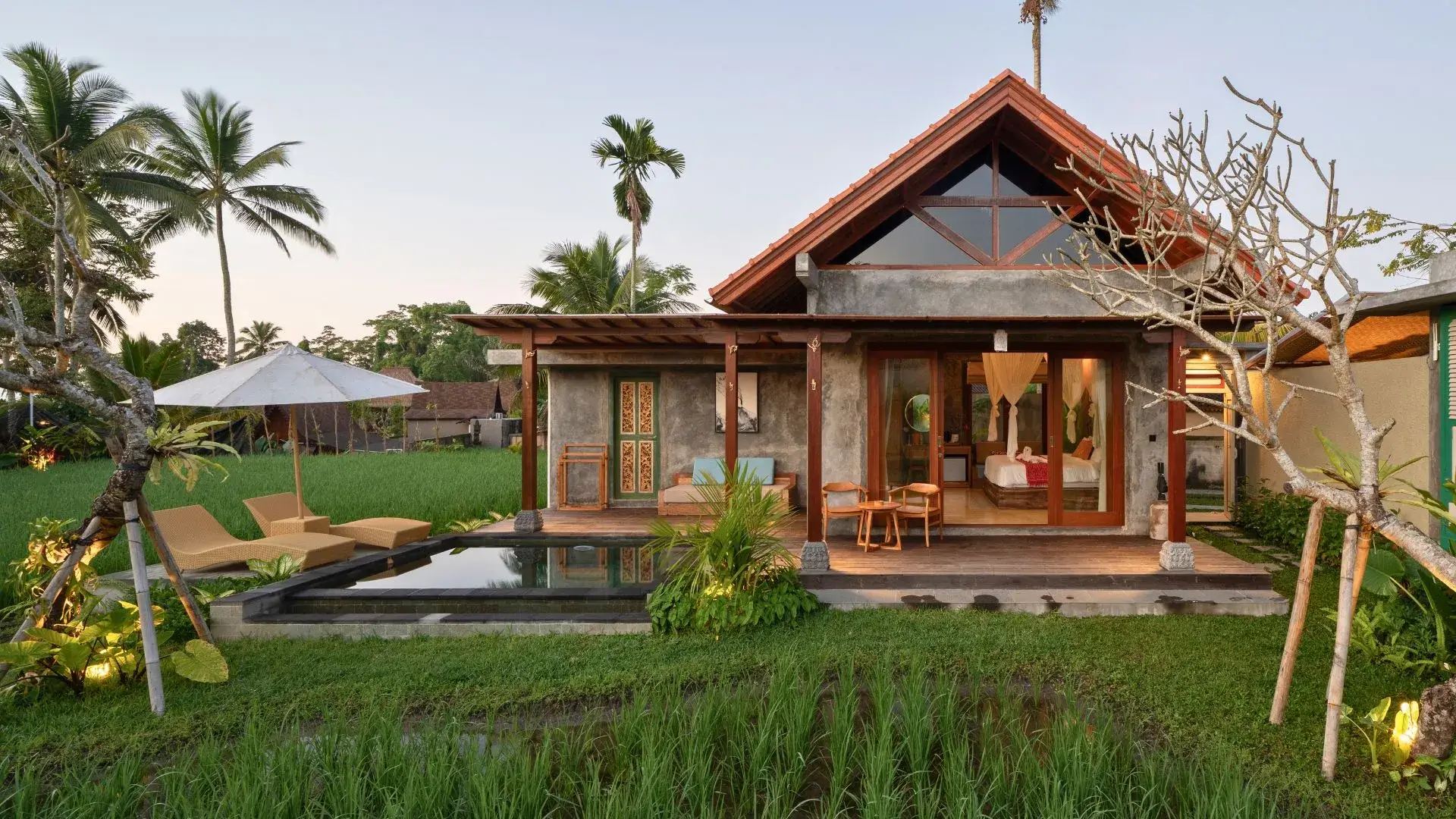 the asiki sebatu villa from the front during sunset